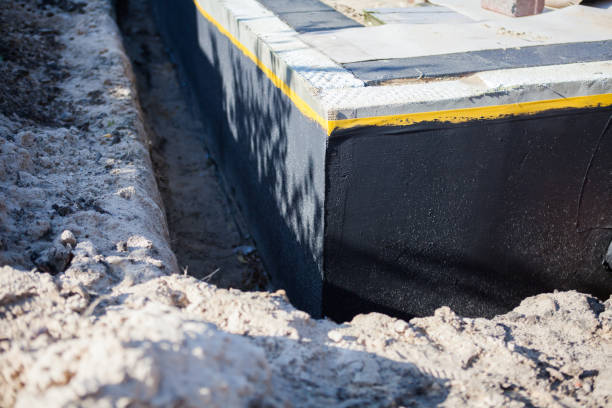 Professional Waterproofing technician working in Rochelle Park, NJ